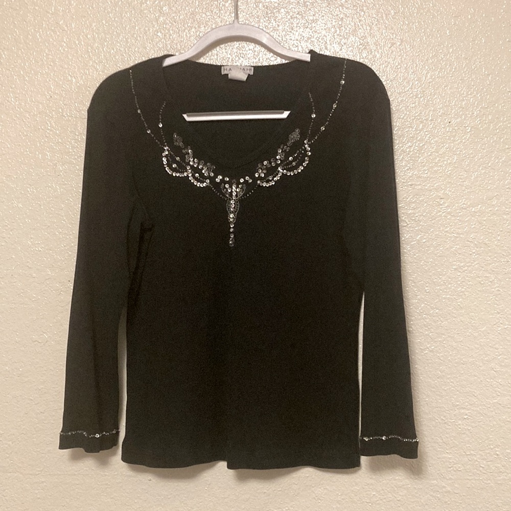 Beautiful black longsleeves has beads. Hannah size large
